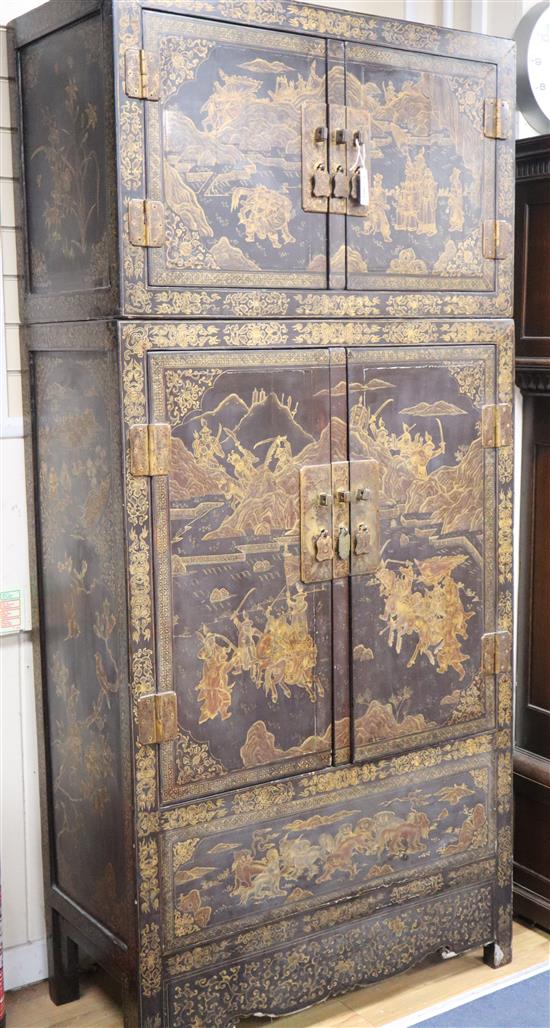 A late 19th century Chinese quing dynasty gilt decorated lacquer compound cabinet with upper hat cupboard, carved Qian Long mark to bac
